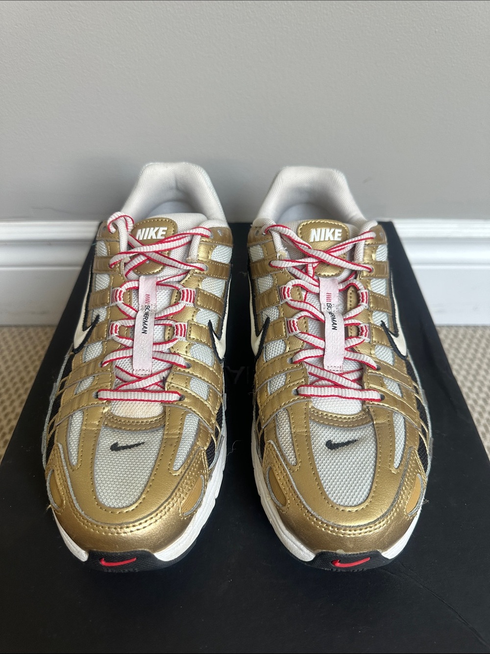 Nike Metallic Gold, White & Black Air Zoom Spiridon Sneakers with Red Accents